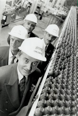 No cap on sales: Business is booming at Fairlee Fruit Juice Ltd. John Dimos (front), his brothers peter (left) and Charles, and Ted Aiexopoulos (rear), all owners, have installed a hands-free bottling line at their company's plant in Etobicoke.