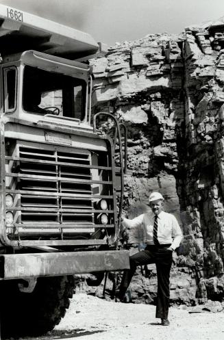 Blow to small business: E.V. (Bud) Drury, of Genstar Stone Products Inc., in one of his firm's quarries, says the proposed annual fee of 6 cents per tonne will be particularly tough on the small businessman.