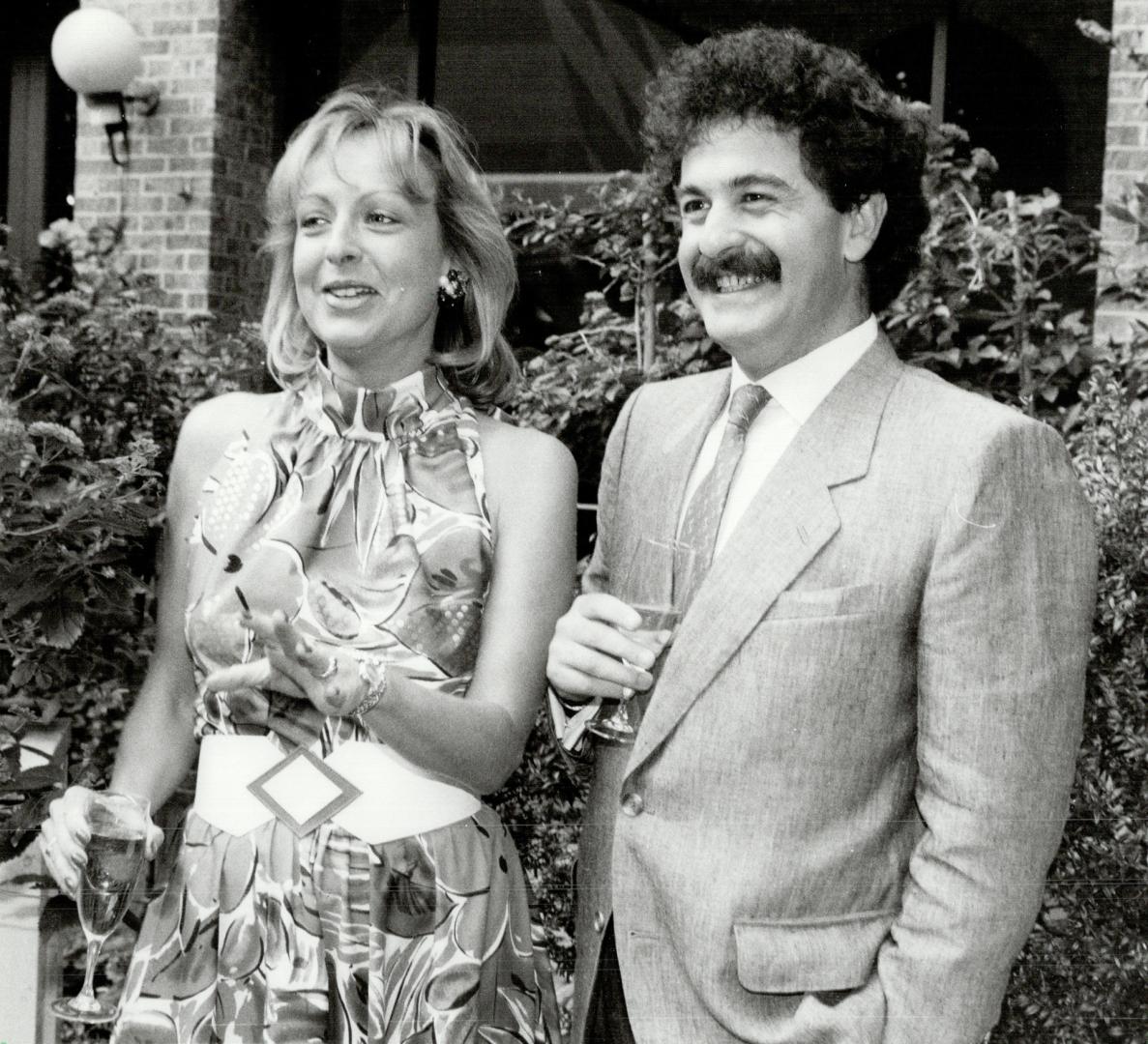 Above, Gerard Djaoui, president of Cartier's Canadian operation since 1980, and his wife Corinne Garnier-Djaoui, in charge of advertising and promotions for Cartier, leave this month for their new post in Hong Kong.