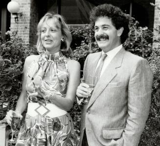 Above, Gerard Djaoui, president of Cartier's Canadian operation since 1980, and his wife Corinne Garnier-Djaoui, in charge of advertising and promotions for Cartier, leave this month for their new post in Hong Kong.