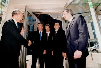 Graeme Eadie, pres., (far left) and Chmn. Charles Masson (far right) greet John P. Curtin Jr., of Goldman Sachs, Kenneth C. Whitney, Managing Director, The Blackstone Group, and Brian Muzyk, V.P. Real Estate of Ontario Teachers.