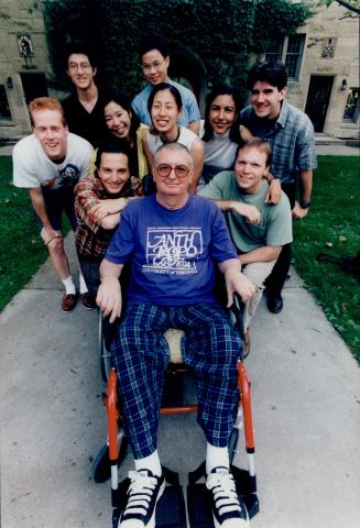 All for one: Among Peter Erhardt's caregivers are, from left, back row, Hai Doan, Anthony Marchie and Roy Morra, middle row, Brian Reid, Sunny-Gaye Bernardo, Esther Oh and Carla Yanez, front row, Domenic Nicassio and Robin Wolf.
