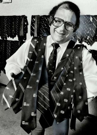Sartorial splendor: Milton Eugene, owner of Eugene Manufacturing, displays some of the ties he has produced for 660 companies in Canada. Eugene says sales are up 30 per cent this year and he plans to expand by opening outlets in Atlanta and Dallas next ye