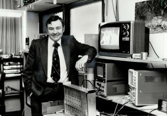 Charles Evans, president of Triple Crown Electronics, expects an explosive new demand for satellite receivers.