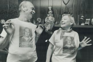 Former prisoner of war, Etobicoke Controller Pete Farrow and his wife, Dorothy, model the sweatshirts they'll wear at a reunion of former air force PoWs in England next weekend. He spent three years as prisoner in World War II after being captured by Germ