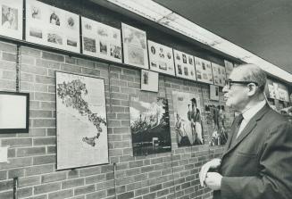 Hendryk Feld, 72, has always enjoyed sharing his knowledge of history and the arts with the young people he meets. Since he came to Toronto from Connecticut two years ago, he has put pu displays in the foyer of the University Settlement. This one commemor