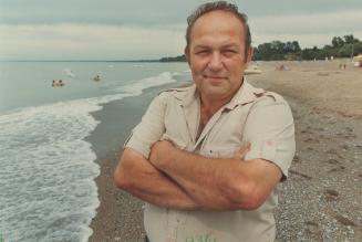 Duel in the sand: Malcolm Gibbs says he is seeking ownership of the Grand Bend beach to fulfil a promise to his late uncle whose grandfather bought a tract of land which included the beach 70 years ago.