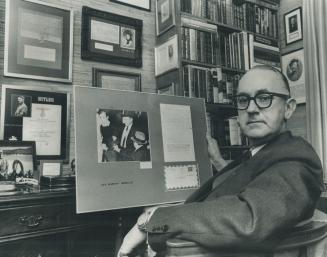 D.S.M. field with his Oswald letter and photo of Jack Ruby shooting. Also in the collection in the library is a document signed by Adolf Hitler (left)