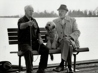 These two men used to be rivals. John Goodchild, left with dog Sam, was a rumrunner and Carl Farrow was Windsor's police chief in those days. Now they're good friends.