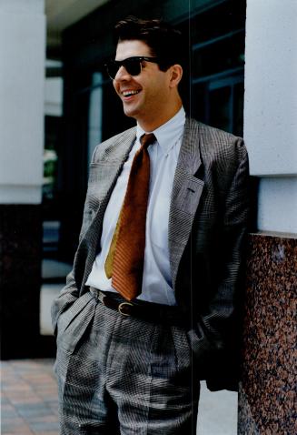 Below: Business consultant Peter Fentum wears glen check linen suit with a buttoned cotton shirt.