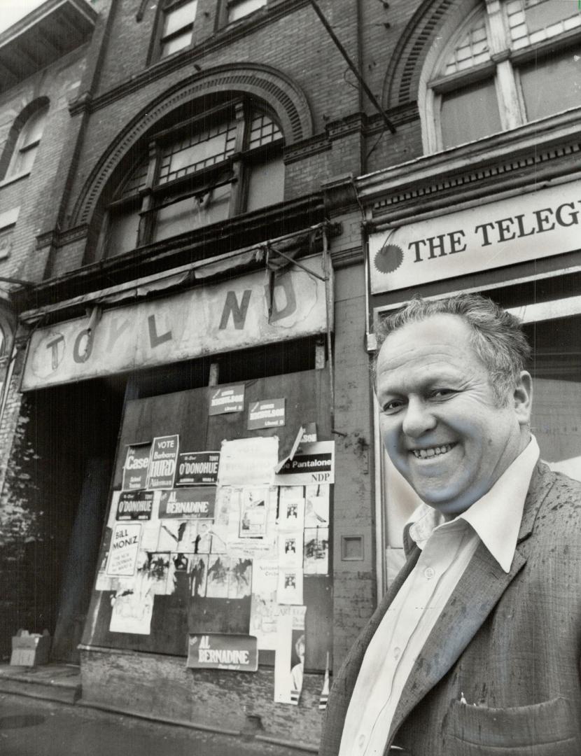 A gamble: Gus Fisher will have to wait a year before he knows whether he ows this three storey store on Queen St. W. near Dufferin one of three properties he bought at a tax sale yesterday for $28,000. The owners can reclaim them by paying teh taxes, with
