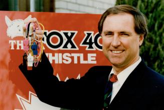 Ron Foxcroft holds pea-less, highly profitable whistles made by his company, Fortron international.