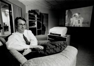 Ultimate viewing: Brian Gammon of AudioVideo by Design (a division of Brack Electronics) watches The Empire Strikes Back in a home theatre designed to take advantage of all the special effects buried in the sound track