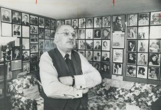 Standing in his DEN Toronto's master limousine driver Lewis Goldblatt is surrounded by photographs of some of the many celebrities he has chauffeured around the city