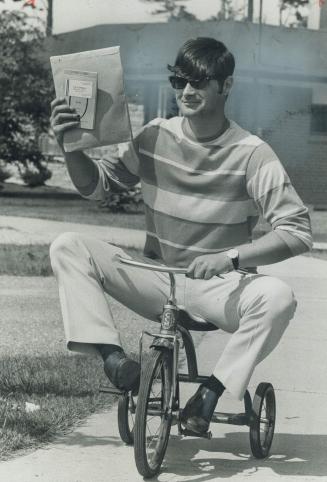 Both his cars were on the road, so Barry Goodhead uses a tricycle to show zip he aims to put into his delivery service