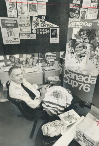 Busy Man: Bobby Haggert, head of Sports Representatives Ltd., is surrounded by posters and pictures as he sits in his office.