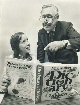 The information is non-sexist and non-racist, he claims. William D. Halsey shows dictionary to Sarah Maloney, 12.