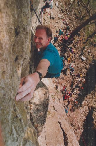 Principal Brian Hibbert indulges his passion for rock climbing at Rattlesnake Point near Milton.