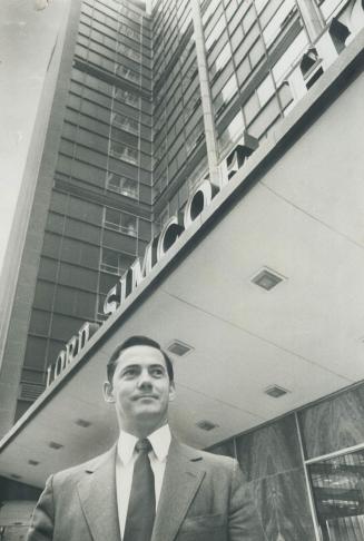 New owner of the Lord Simcoe Hotel in stock-broker Peter Hill, 34, standing in front of hotel on King St