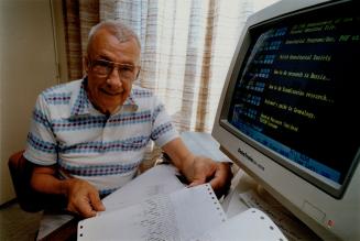 Back in time: Ken Gowie sits by a computer he uses to help people trace their roots. He has traced his own family back 14 generations.