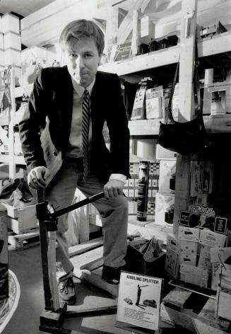 Brian Gray: Owner of a store that presents and sells newly invented items demonstrates the kindling splitter, Invented by Diana Richer of Oshawa.