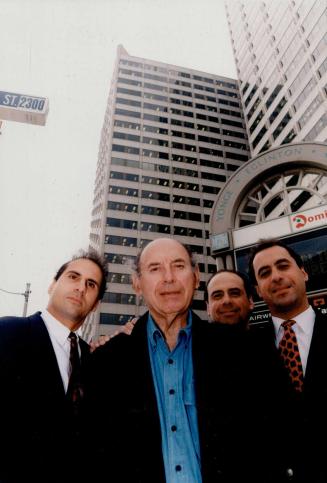 Family ties: Greenwin Construction principal Harold Green stands in front of his company's headquarters, the Yonge-Eglinton Centre, flanked by sons Kevin, left, Eric and Cary who are all in the construction trade