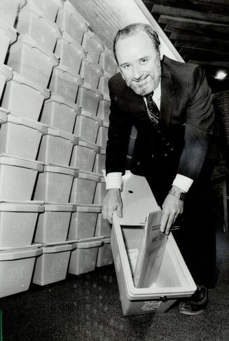 Getting ready: Oshawa city clerk Bob Henderson looks over ballot boxes in preparation for the Nov. 8 municipal election.
