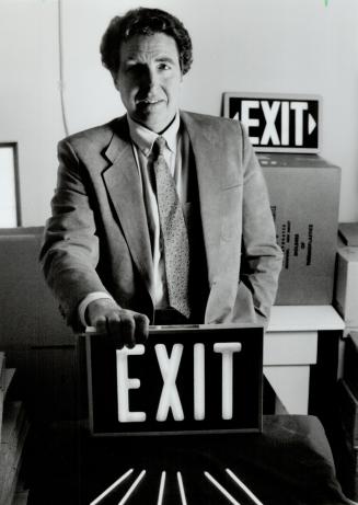 Glowing business: William Hegarty's company plans to double staff to meet demand. Anti-nuclear activities oppose use of tritium gas in signs.