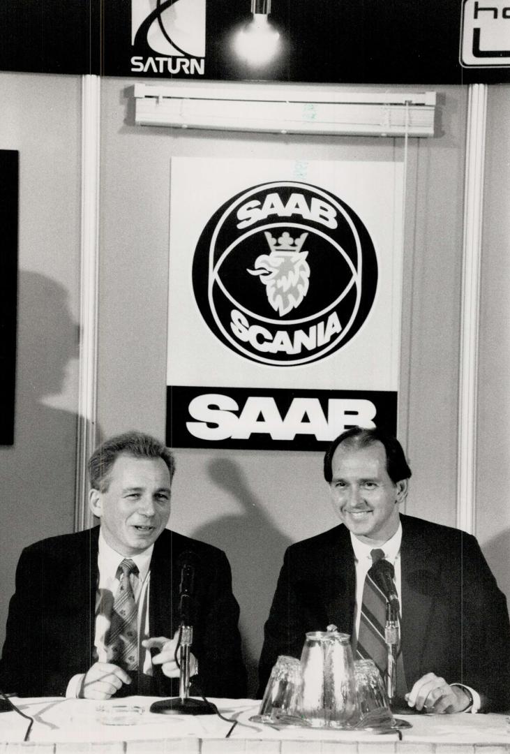 GM-Saab Deal: Saab president David Herman, left, and GM of Canada president George Peapples announced that GM will distribute the Swedish cars in Canada