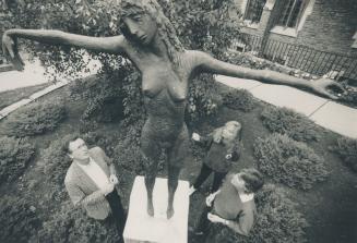 Domestic violence: Roger Hutchinson, Tracy Trothen and Vivian Harrower stand near a sculpture at the University of Toronto symbolizing the abuse women, suffer