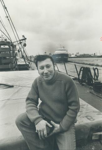 Norair Kassabian sits on deck. His job: To guard four $5 million ships over the winter