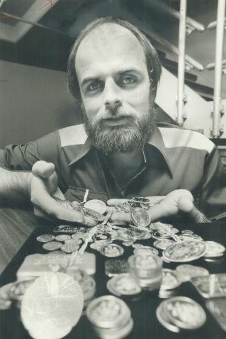 Paul Kelly with $23,000 worth of coins