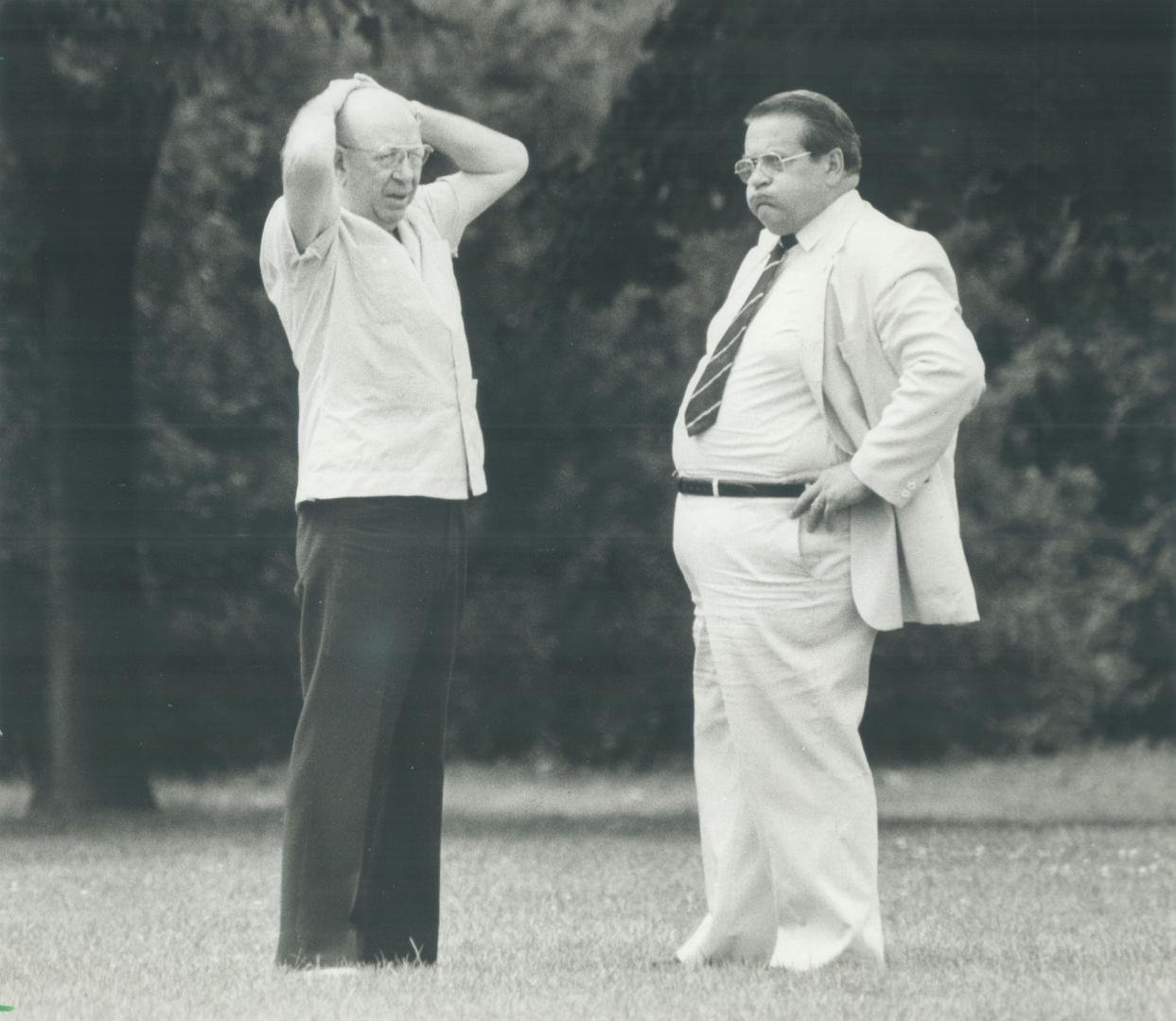 Public park talks: When union local president Bob Kennett (left) refused to cross a picket line to meet mayor Dennis Flynn in Etobicoke's Civic Centre, the two men held informal negotiations in a public park across the street