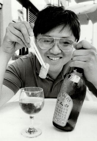 Well wedded: Frank Hsu, owner of Young Lok restaurant, has the perfect wine mate for any meal of Chinese food, Lee Tai Po, a blend of California and Ontario wines