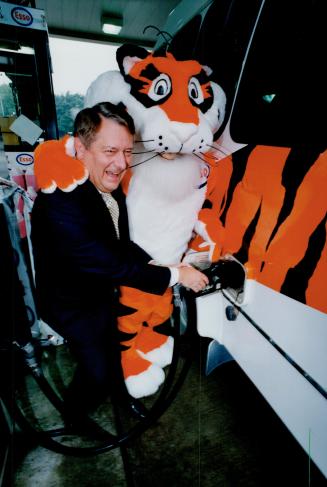 Long time no see: Imperial Oil executive Bill Innes welcomes back the Esso Tiger yesterday