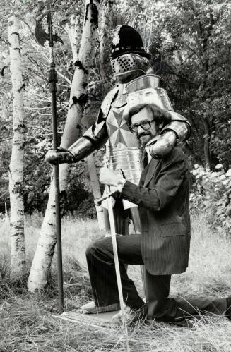 Bullish business: Graham Jackson hams it up with his trademark Henry, in a suit of armor - one the site where the new British Bulldog tavern will be built