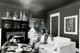 Family room: The upstairs den, left, is where the Jackson family spends most at-home hours