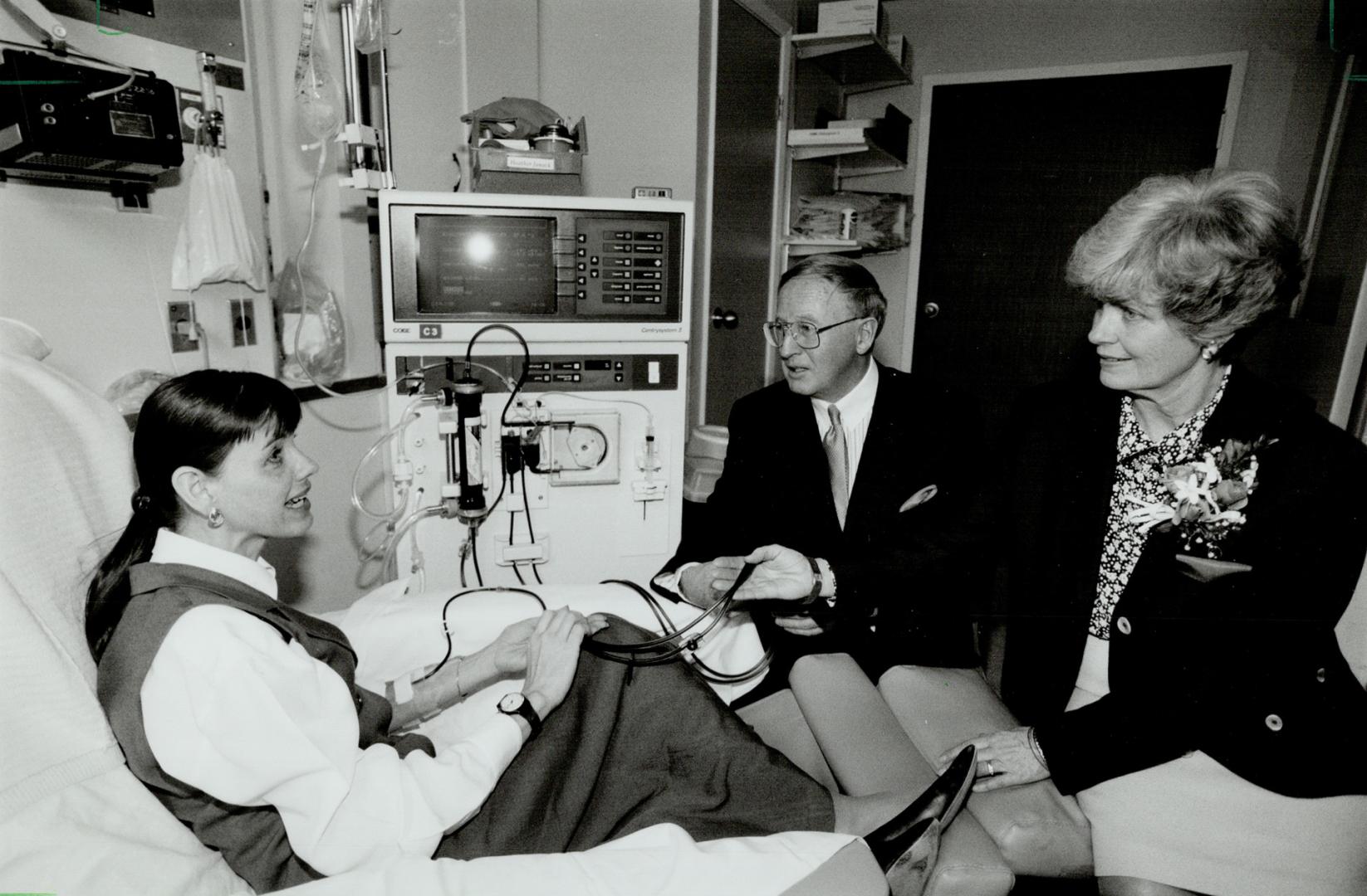 Dialysis life-line: Heather Janack, undergoing the blood-cleansing she needs three times a wek, thanks Patrick and Barbara Keenan, who donated $2 million yesterday to St