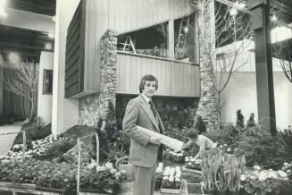 Architect E. Geirge Kneider and the $450,000, 7,000-square-foot model home his firm designed for the 1978 National Home Show.