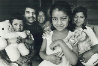 Reunited Family: from left, 5-year-old Walter Lopez, with parents Ignacio and Amalla, and siblings Norma, 7, and Maroio, 12.