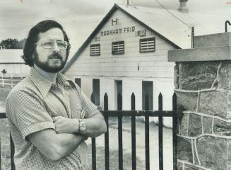 Leader of citizens' group that is fighting to save the former Markham Fairgrounds, Jack Luftman stands in front of the main building of the Markham Fair, which has been held there annually since 1855