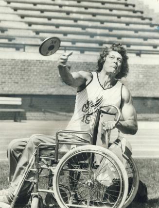 Doug Lyons of Quebec hurls the discus in preparation for the 1976 Olympiad for the Physically Disabled.