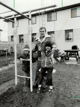 Backyard visit: John Langcaster's children - Jennifer and Christopher - aren't allowed to play in the backyard since radioactive soil was discovered around their McClure Cres