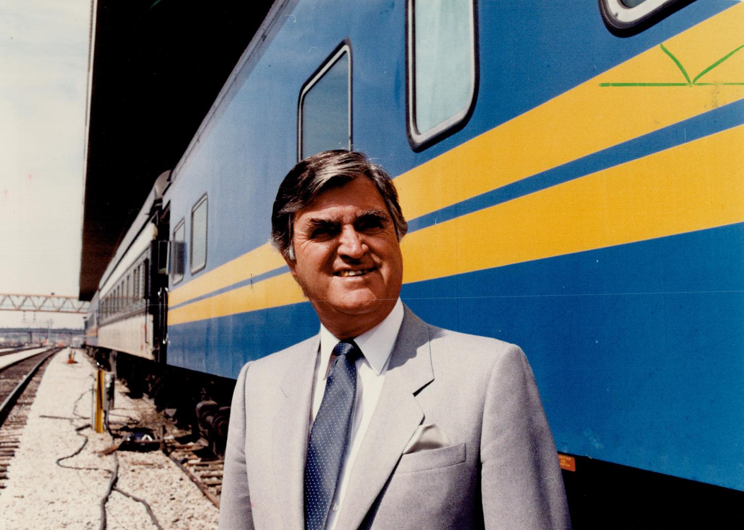 Belt-tighening: CN's president Ronald Lasless stands beside the rail car that serves as his travelling office