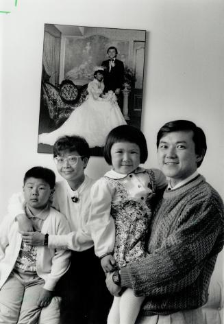 Proud Canadians: Hong Kong immigrants simon Wing Leug, his wife Irene, children Joe, 7, and Joanne, r, will be sworn in a citizens at a ceremony tomorrow