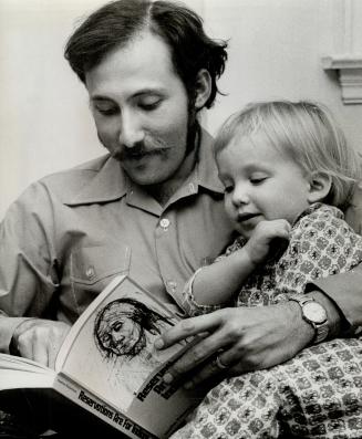 Bruce Lewis with his son Pericles