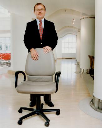 Not sitting still: Michael Lobbestael with Steelcase office chair.