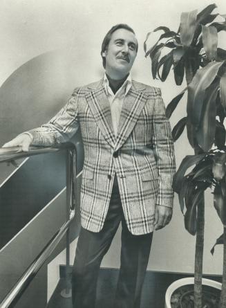 Charles Mason, director of advertising and public relations, wears a coordinated cruise outfit