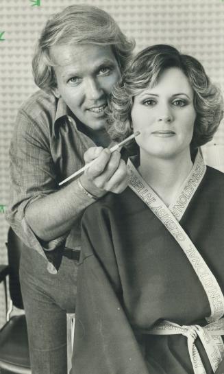 George masters, international beauty consultant, adds finishing touch to Susan Soteroff's face makeover at the Glenby International Beauty Salon at the Toronto Eaton Centre