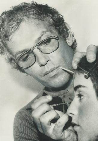 George Masters, make-up artist to famous women makes up Susan Winberg at Mary Tripi's Beauty Salon.